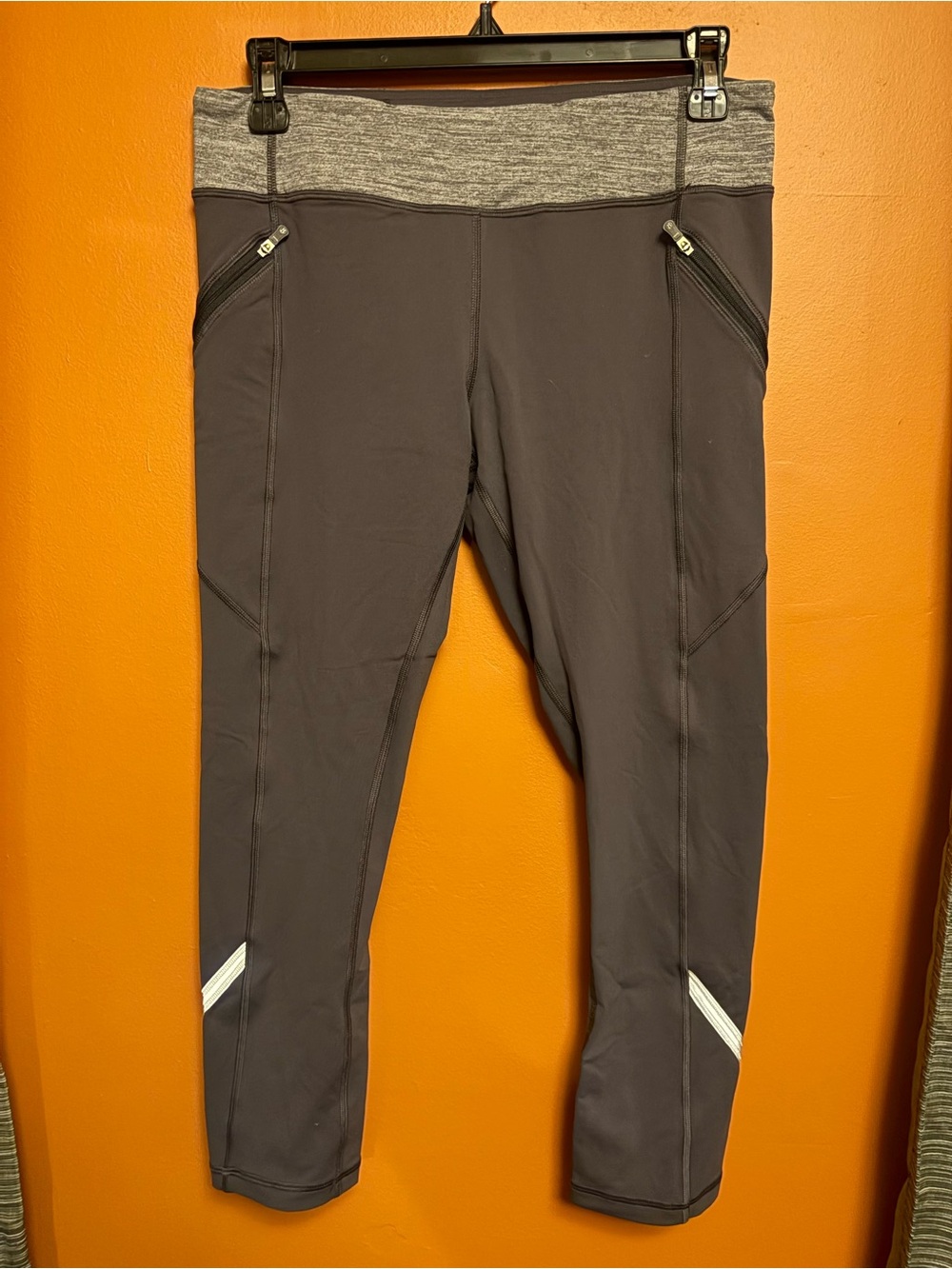 Lululemon Wonen’s Black and Gray Performance Leggings with Zipper Pockets
